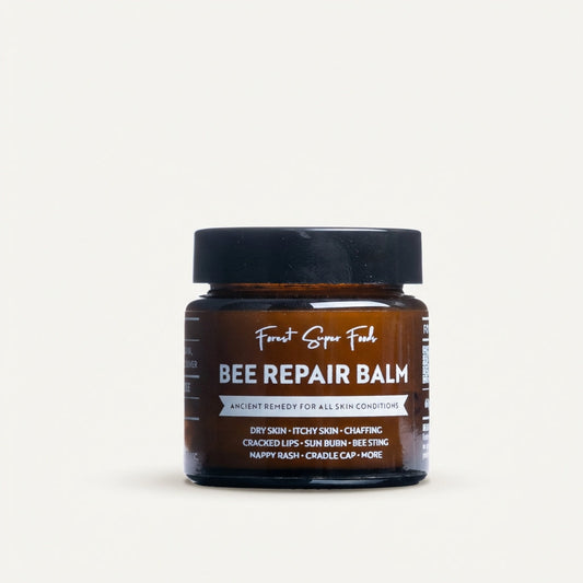 Jar of Bee Repair Balm on a white background